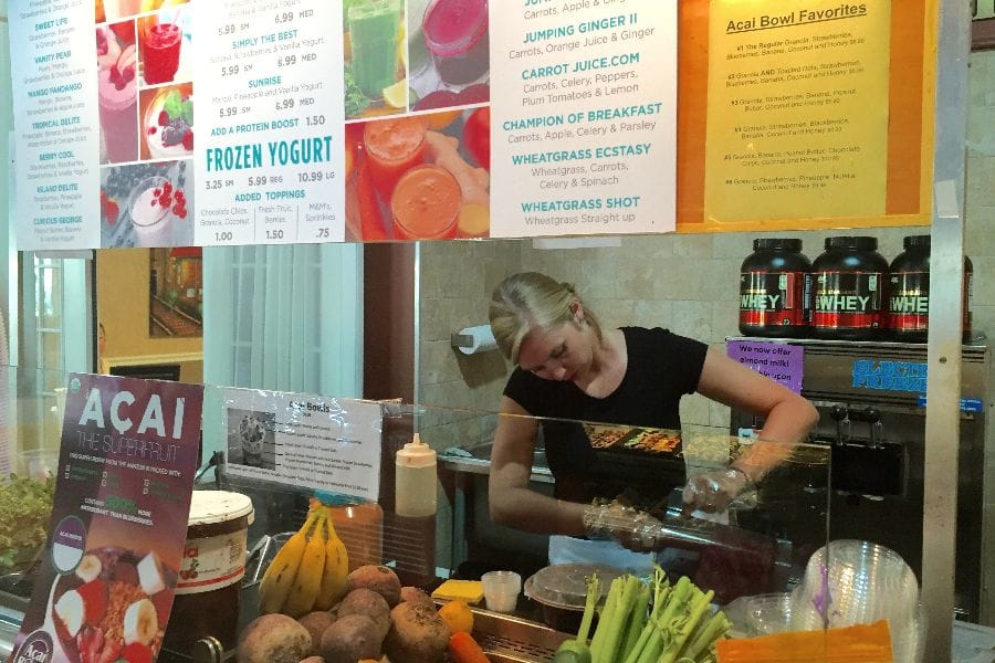 Kristie at Kitchen Kabaret hard at work making acai bowls.