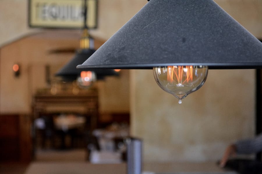 The bar is trimmed with modern fixtures.