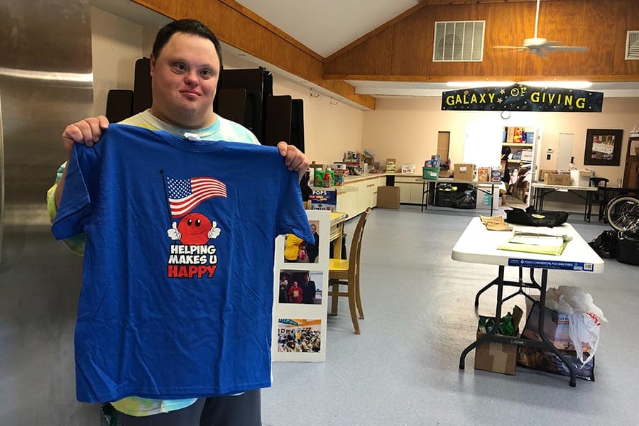 Helping Makes U Happy founder Keith Caputo