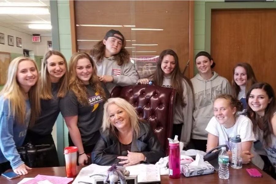 Donna Lyles-Papa and students at school