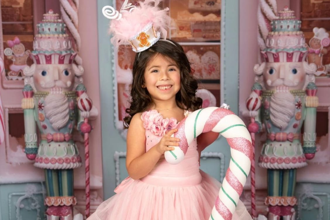 Young girl in a dress.