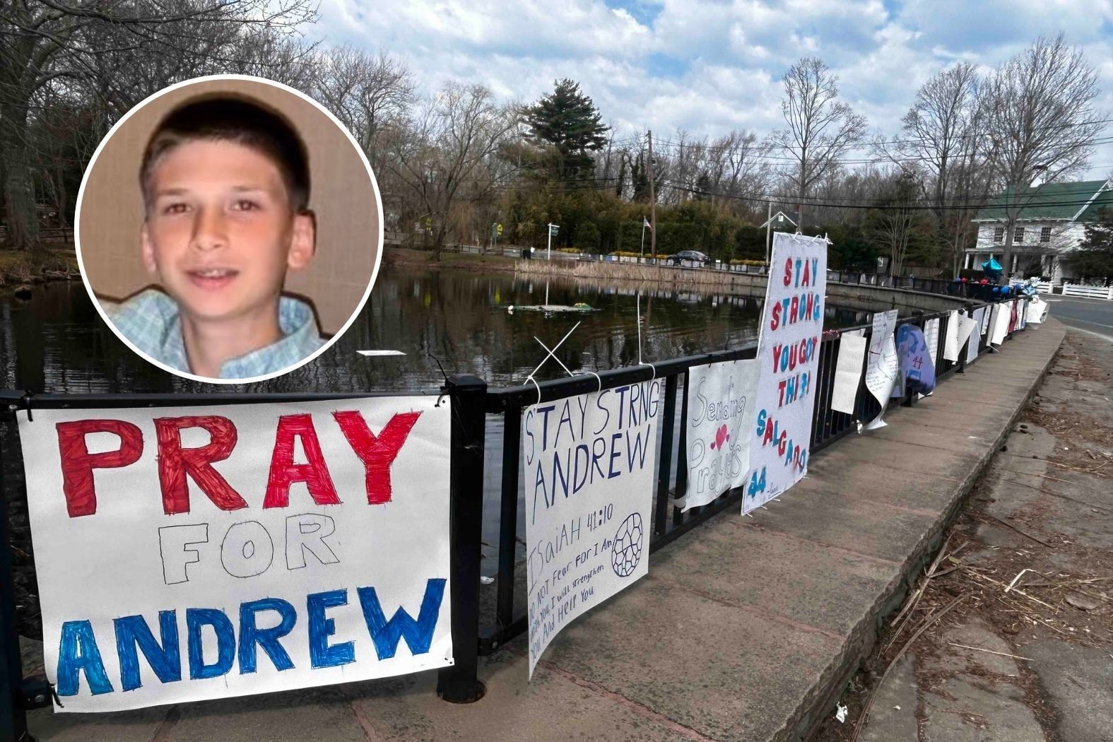 Handwritten signs of encouragement for Andrew Salgado displayed along the wrought iron fence at the Miller Place Duck Pond.
