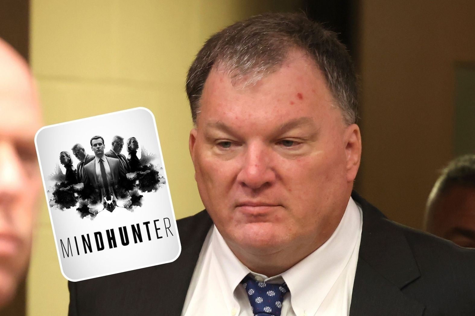 Rex Heuermann in a courtroom, dressed in a suit, with an inset of the Netflix "Mindhunter" series logo.