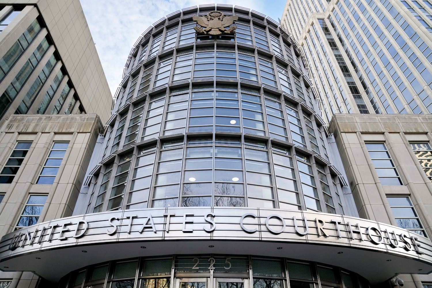 front of federal courthouse building in Brooklyn.