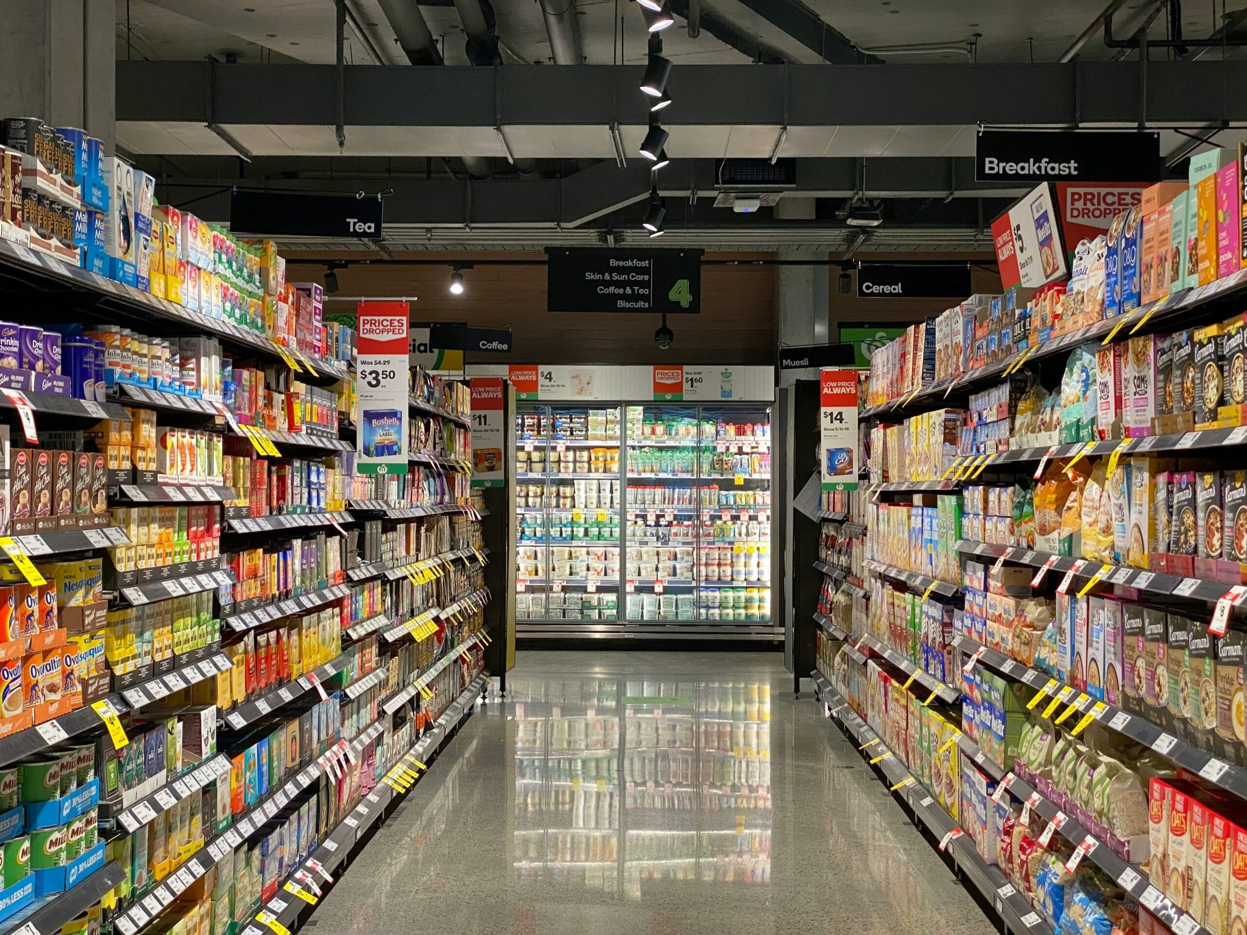 Supermarket aisle with cereal.