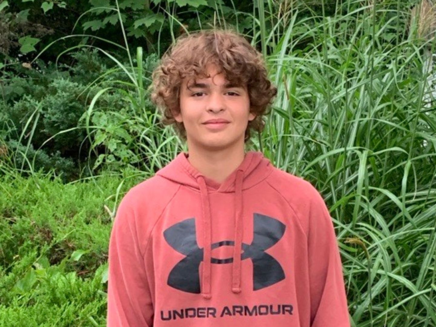 Chris Coluccio in hoodie sweatshirt.