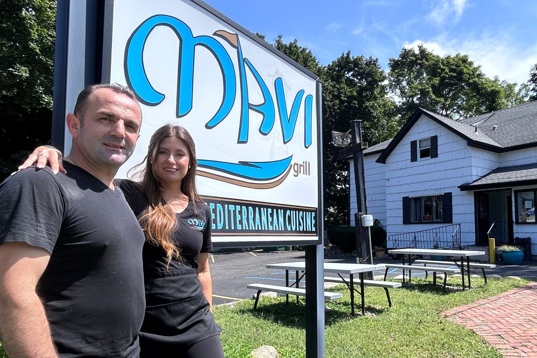 TJ and Lauren Kola, owners of Mavi Grill in Mount Sinai.