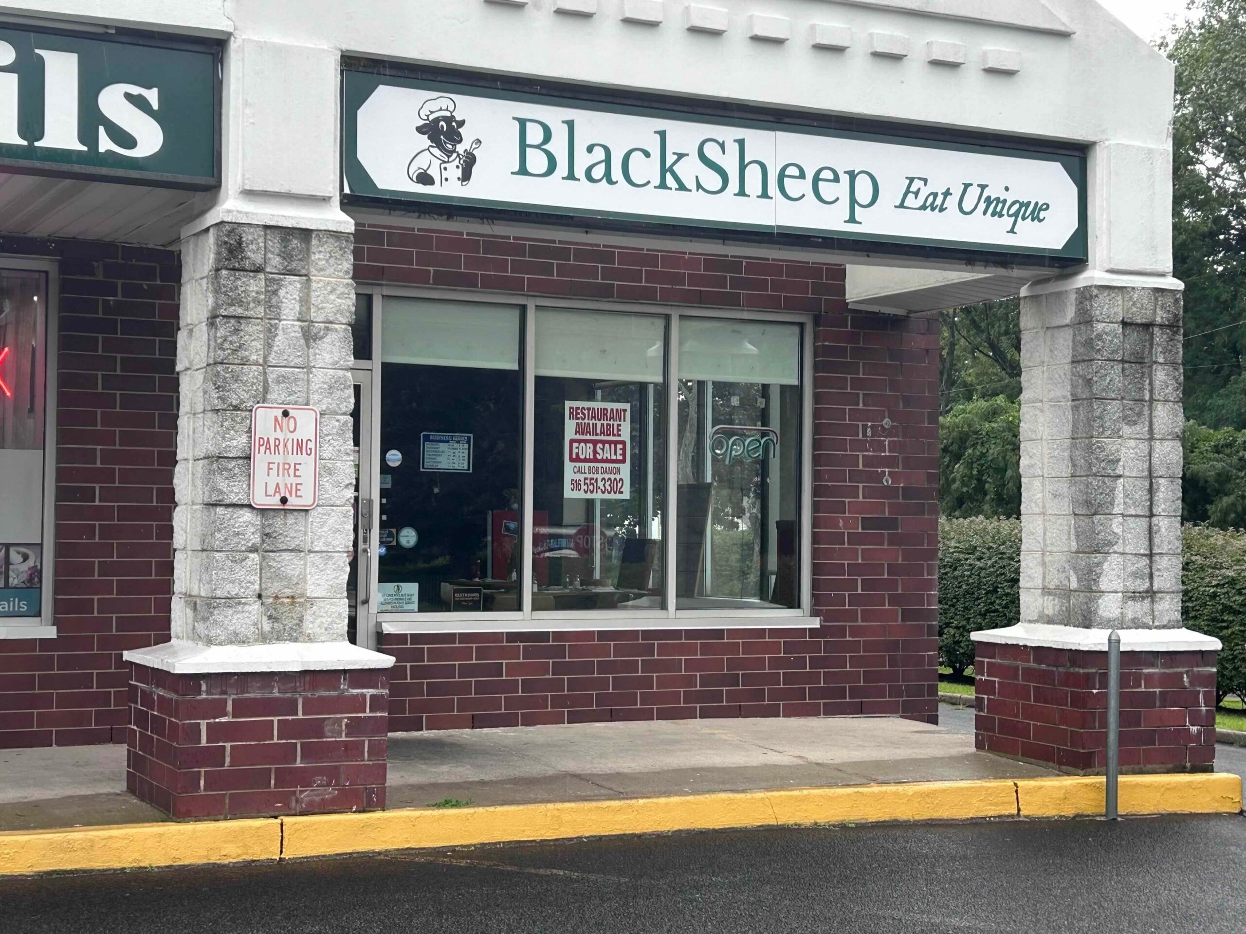front of closed Black Sheep, exterior shot.