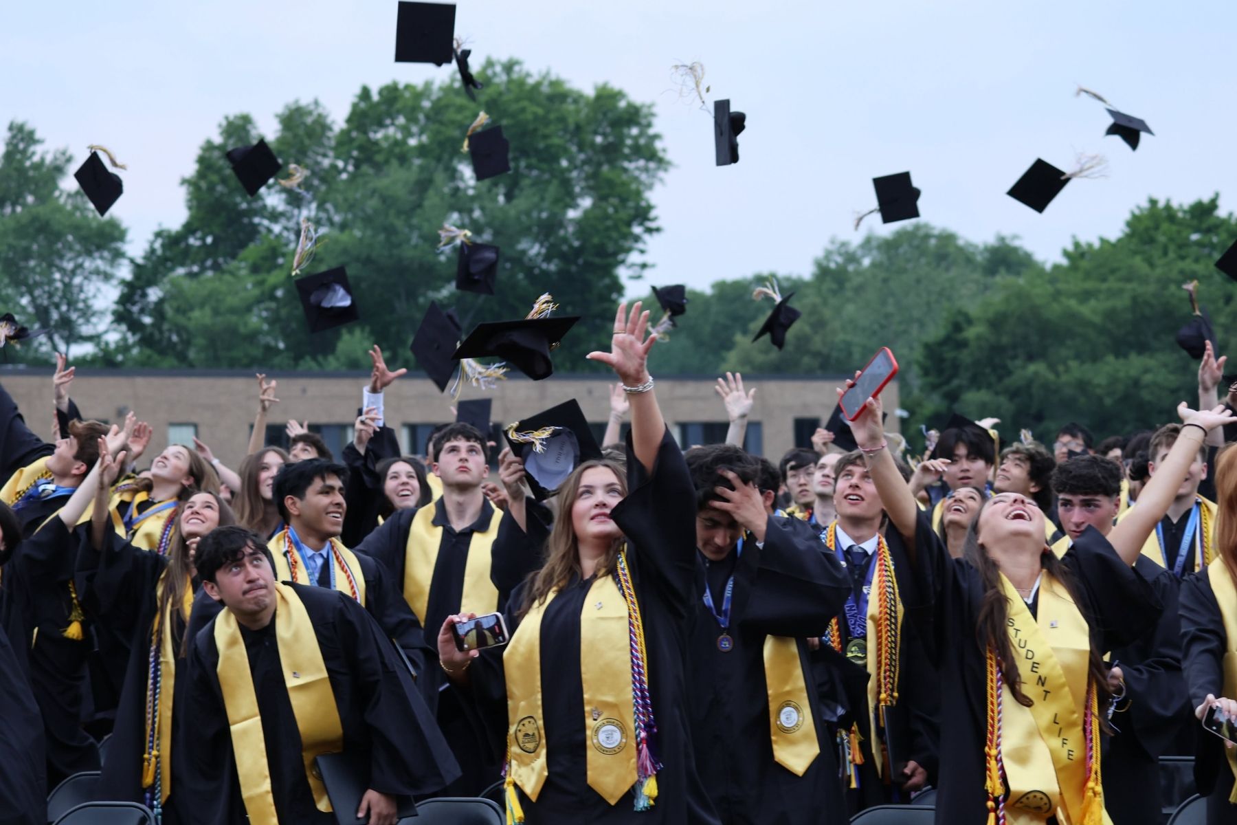 Commack High School graduates celebrate at commencement in June.