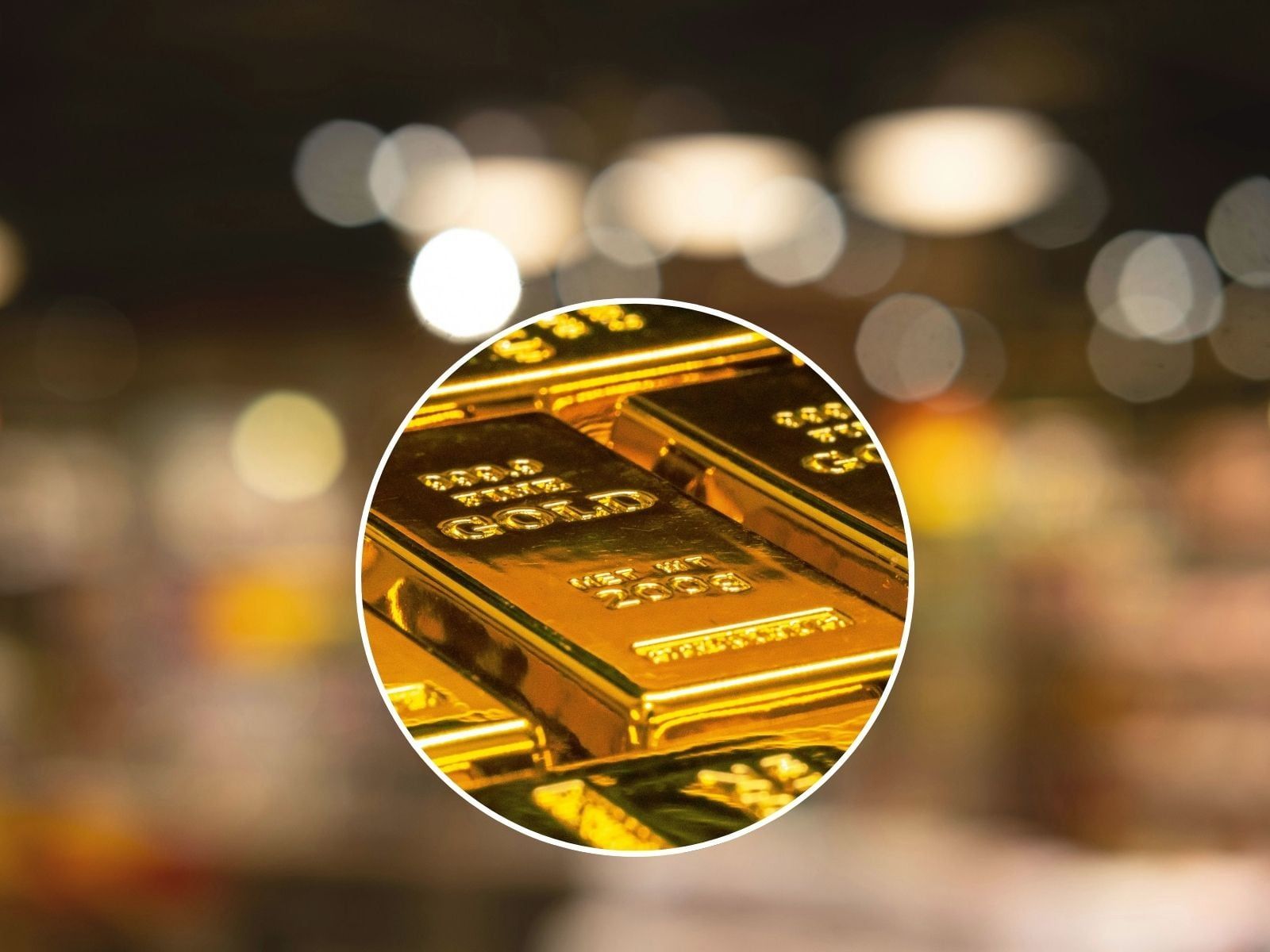 Gold bars and blurred store background