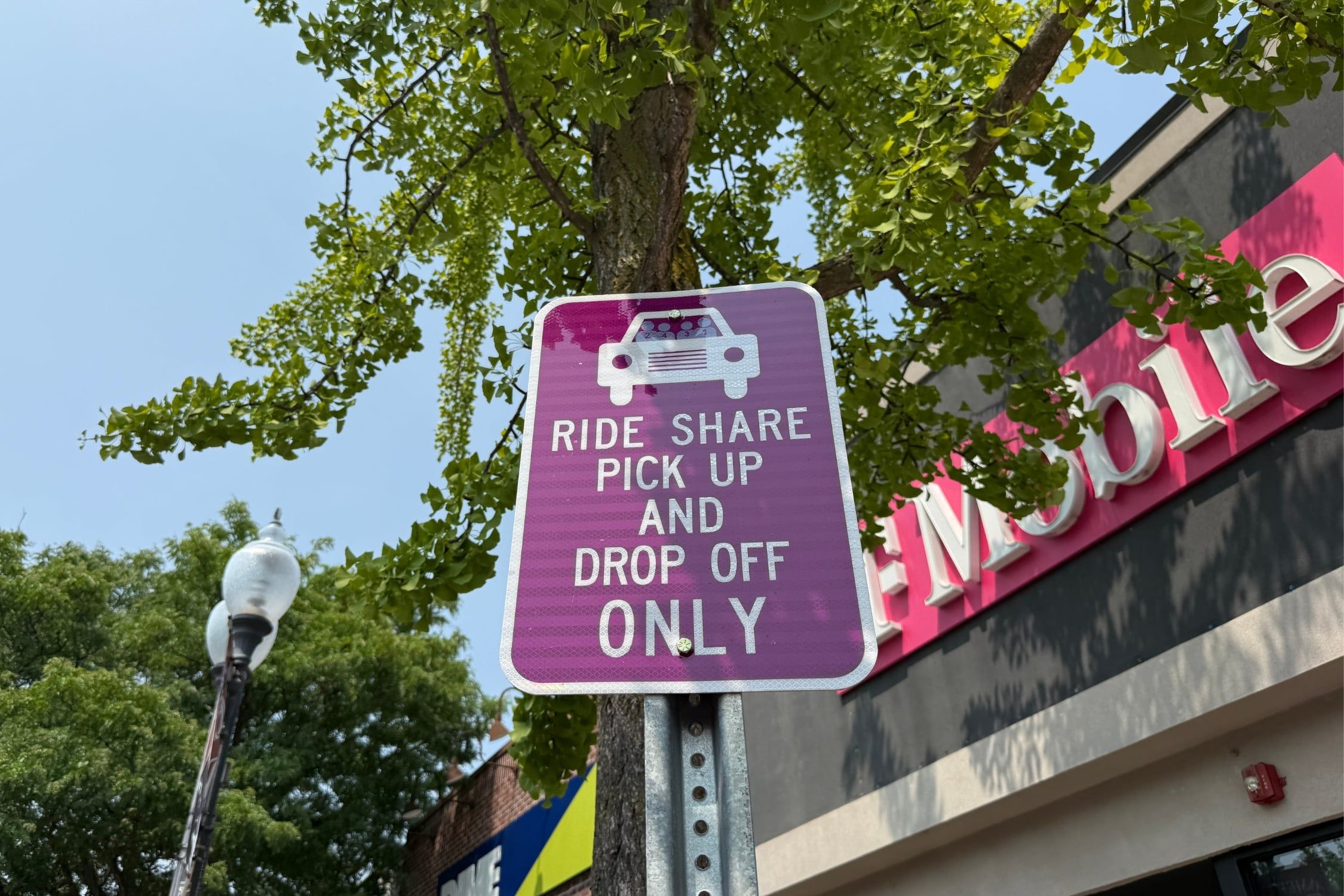 Rideshare parking sign in Patchogue.