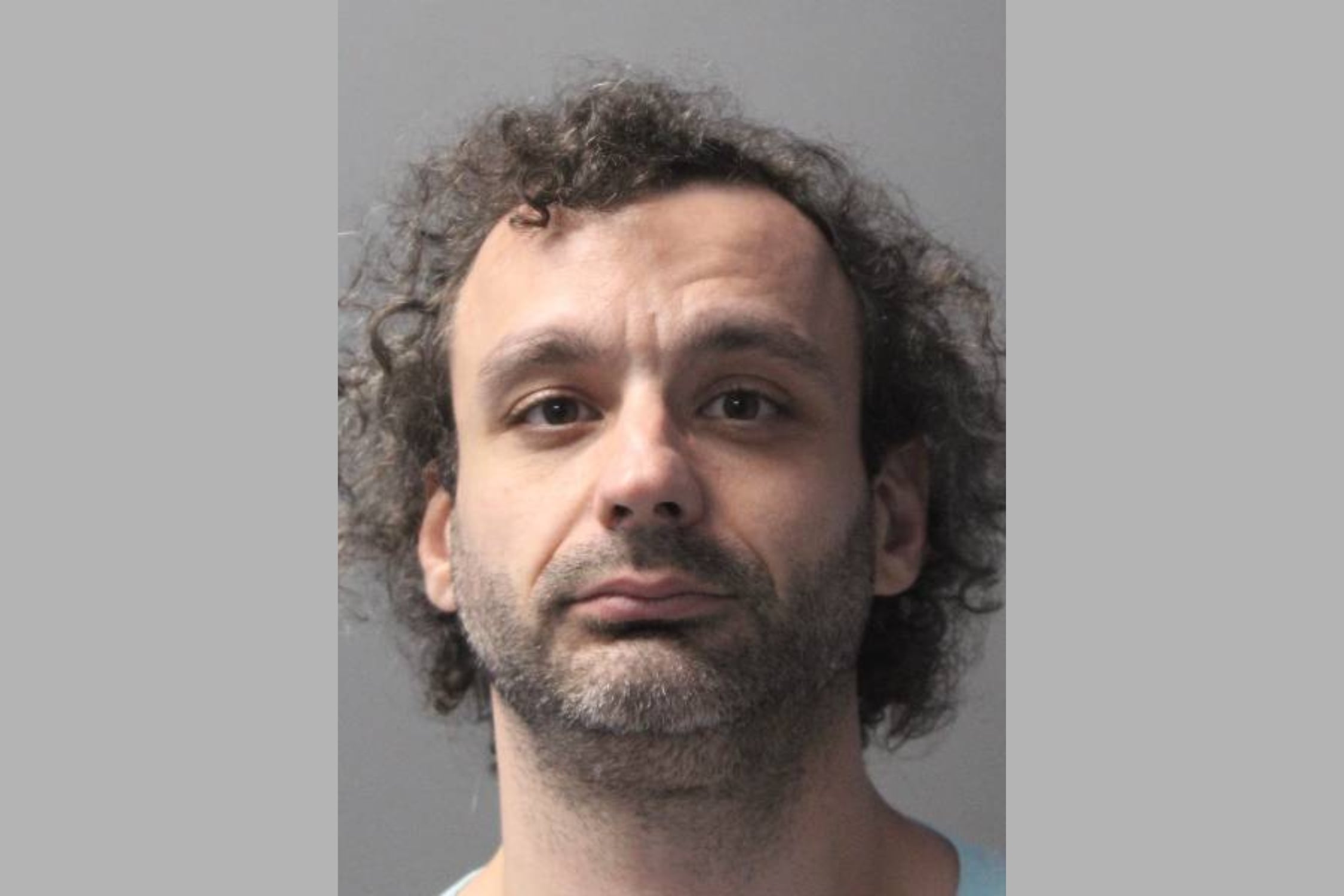 Massage spa employee arrested, his mugshot