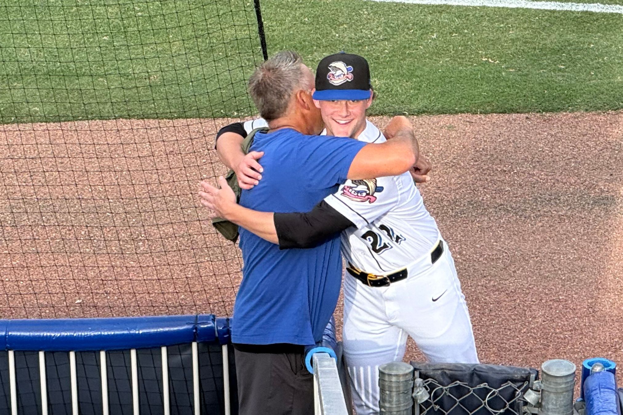 Josh Knoth hugging high school coach Anthony Frascogna
