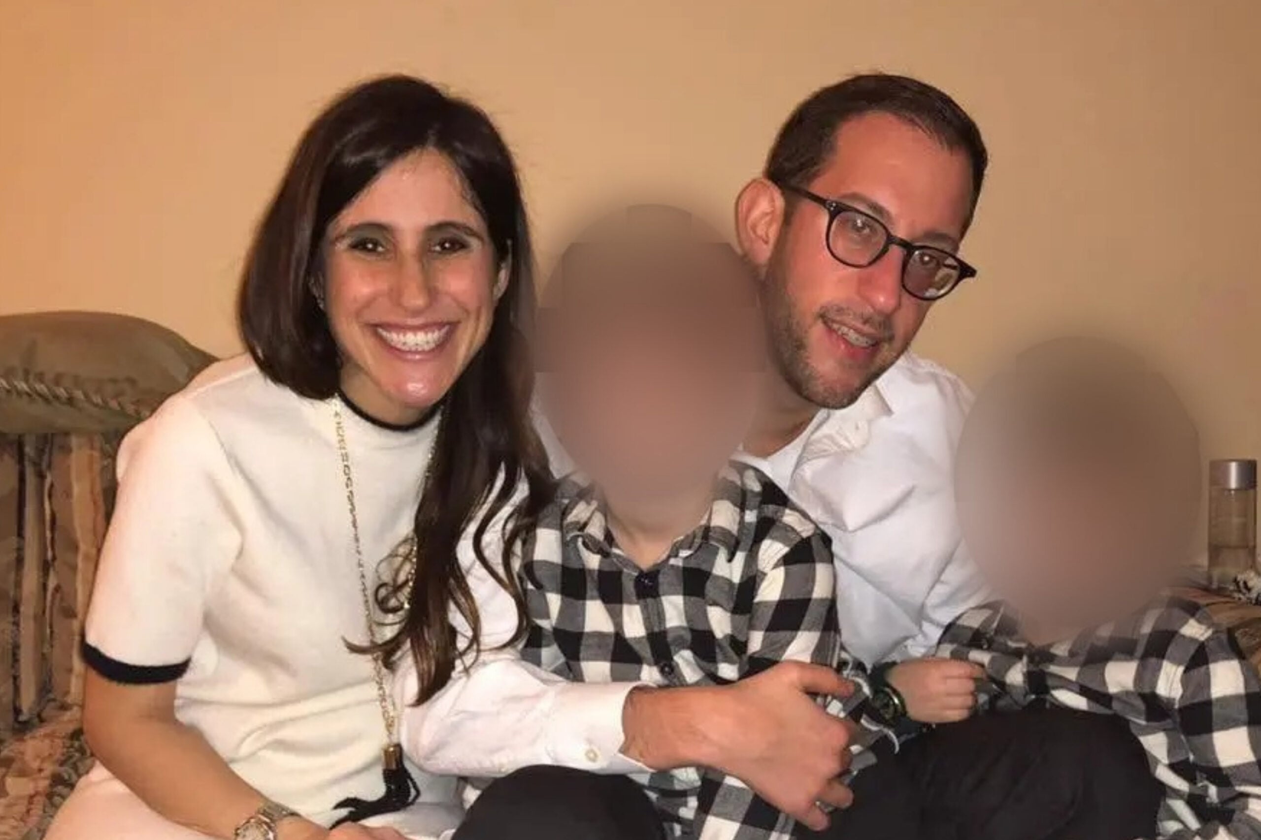 Ally Rahmani and her family, children's faces are blurred.