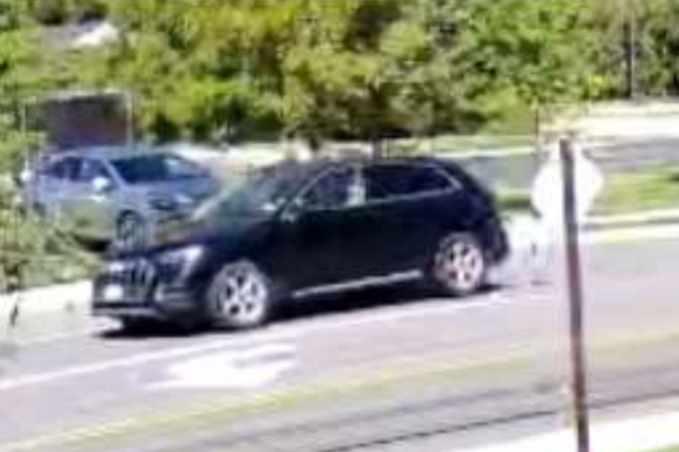 Surveillance image of a black Audi SUV police say was driven by a man who approached a 14-year-old girl in St. James.