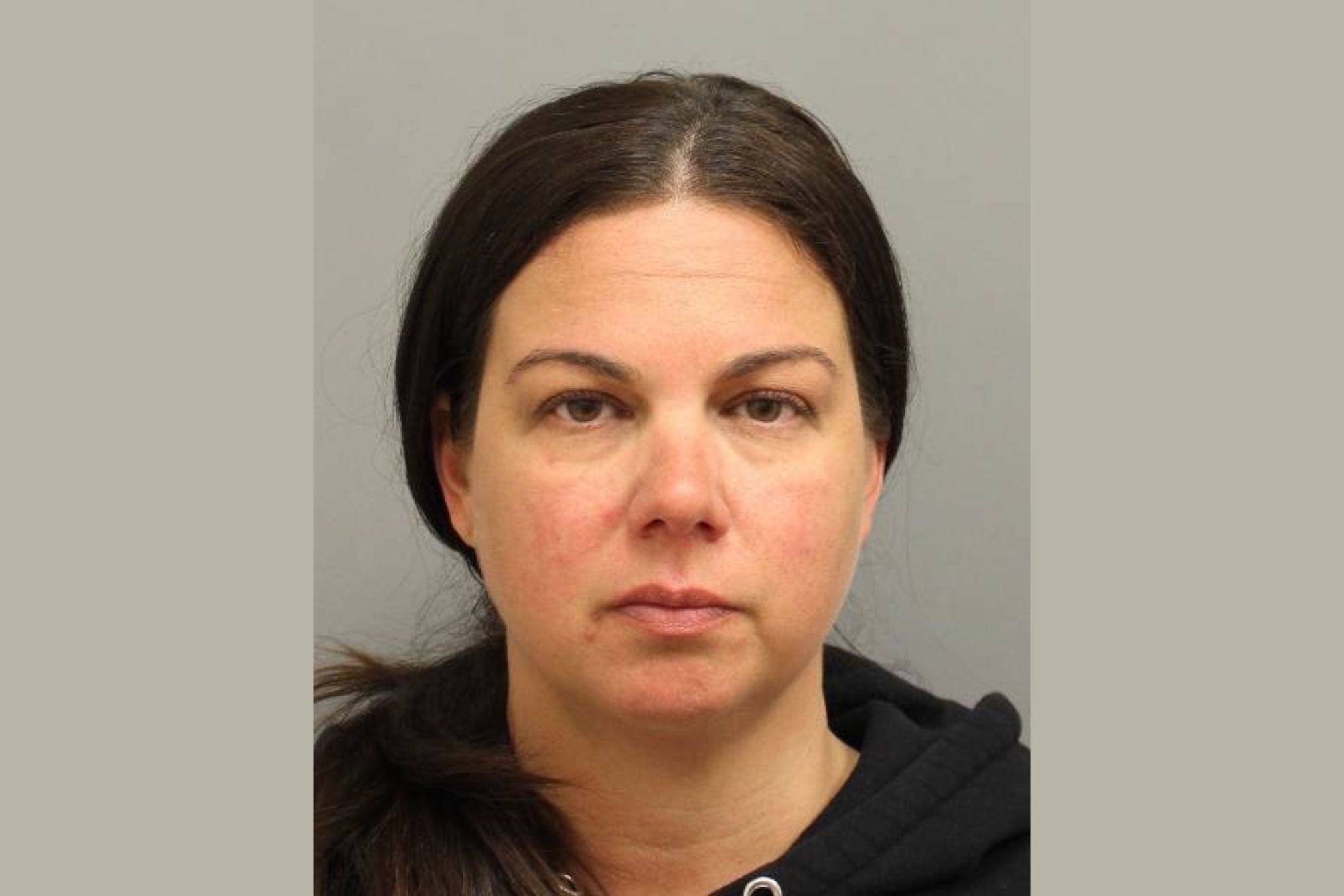 Booking photo of Jodi Scarlatos, former PTA treasurer at Jericho Elementary School in Centereach.