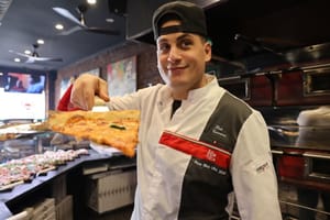 Taglio again cracks Top 50 Pizza's annual Best Slice list. Owner Rob Cervoni with a slice.