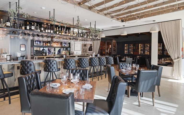 The story behind Enology Wine Bar in St. James goes well beyond wine