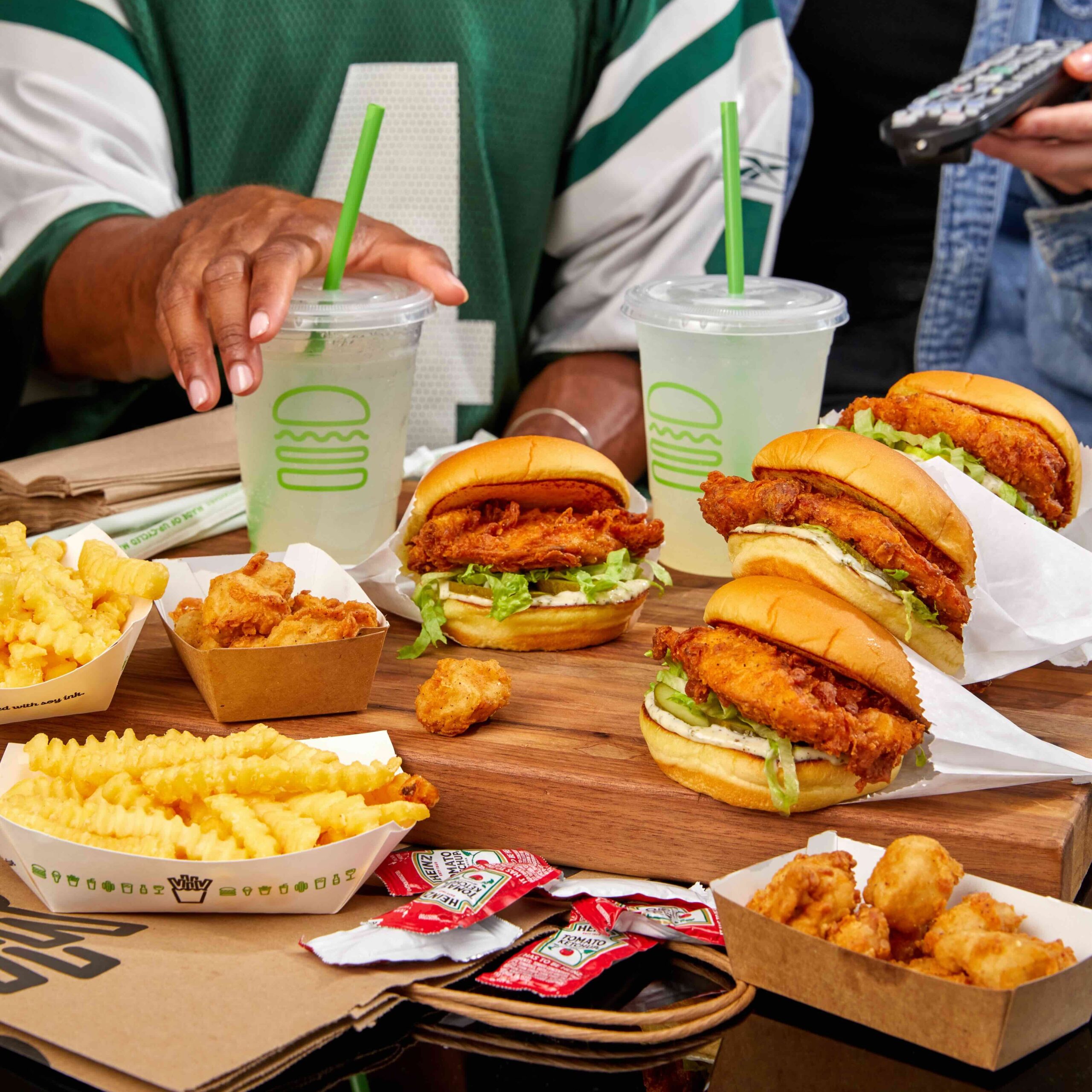 People about to eat Shake Shack food.