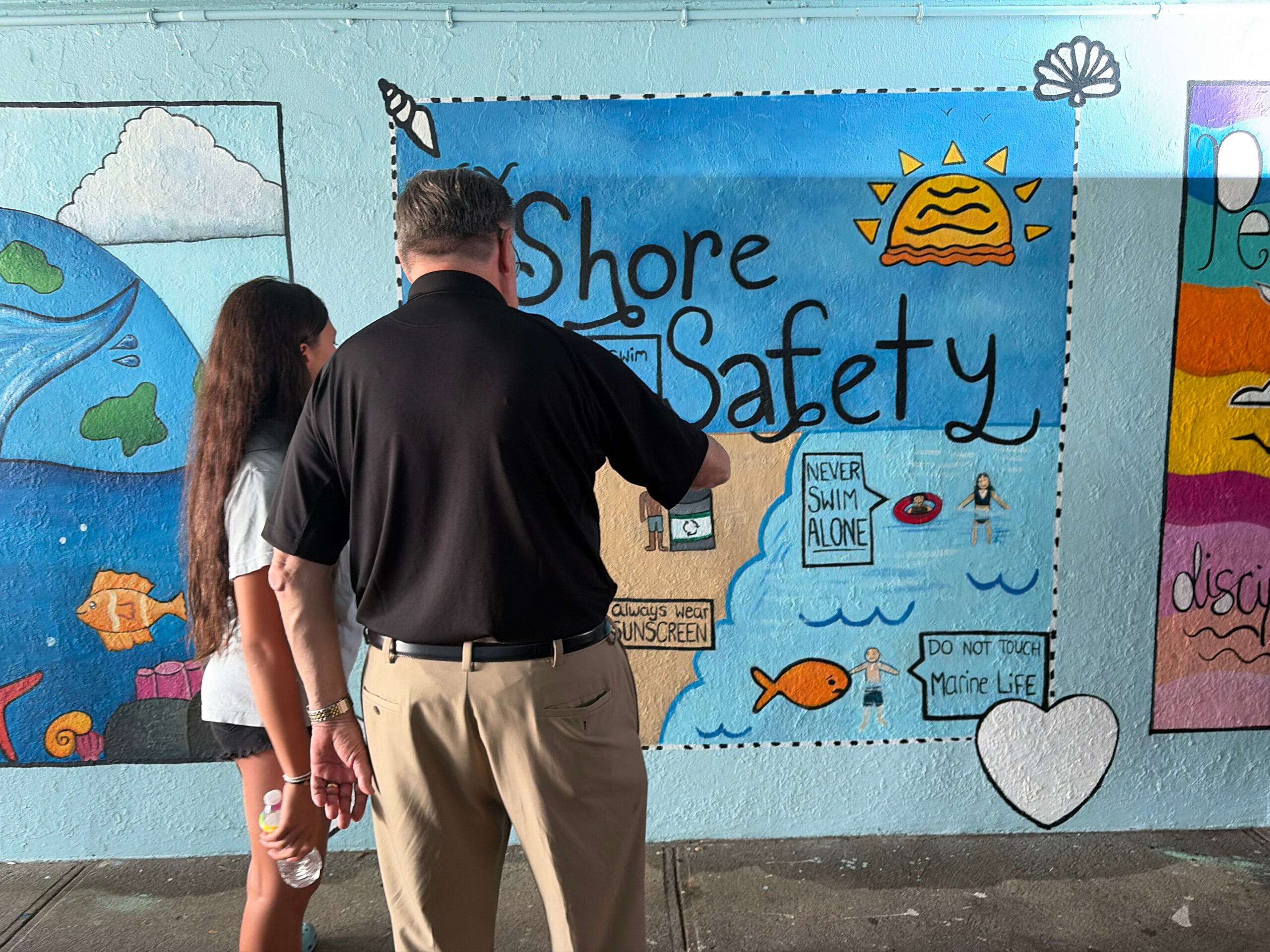 Student artists transform Smith Point tunnel into colorful public gallery