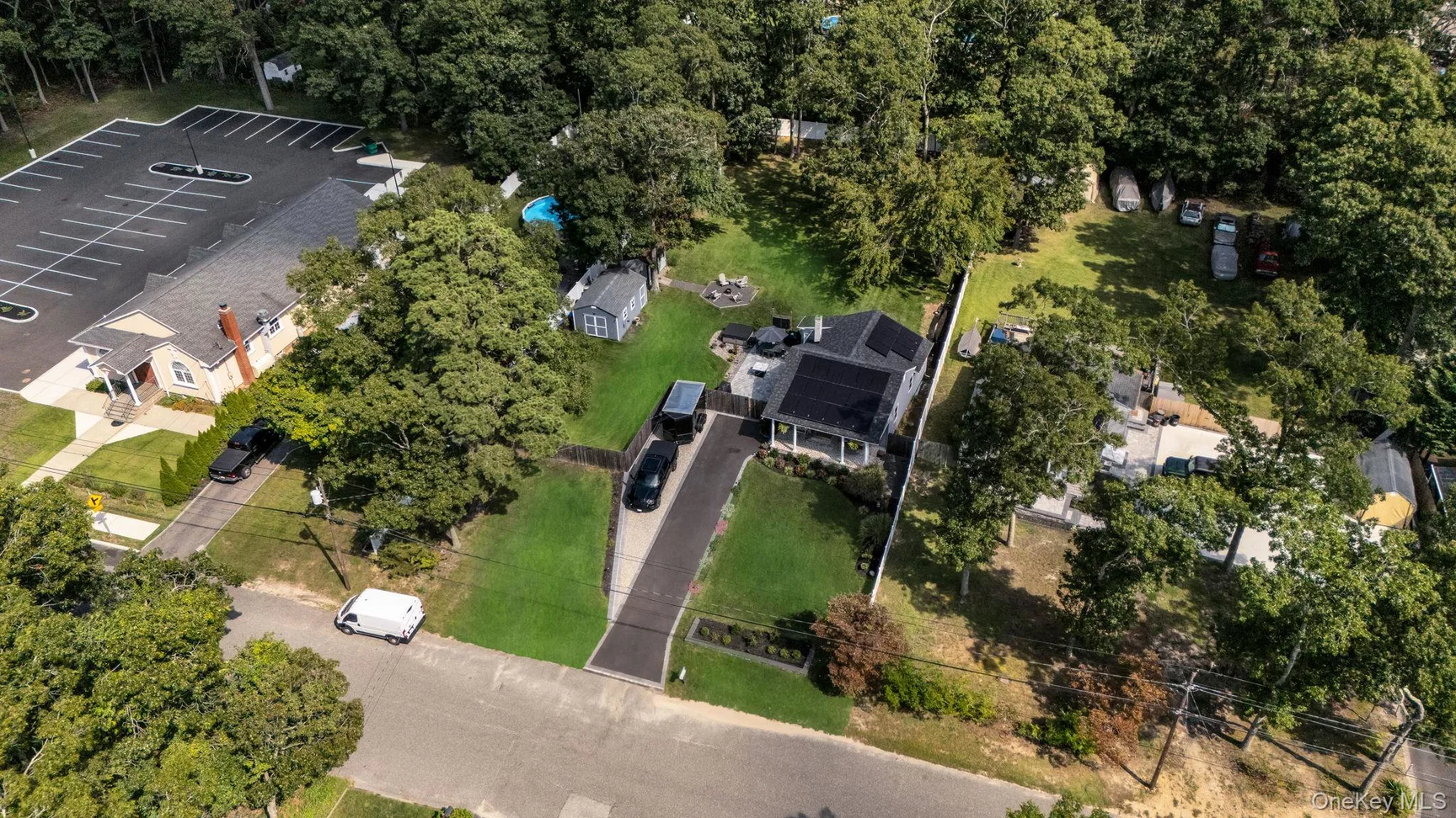 This little Shirley gem has a big backyard and a $469,999 price tag